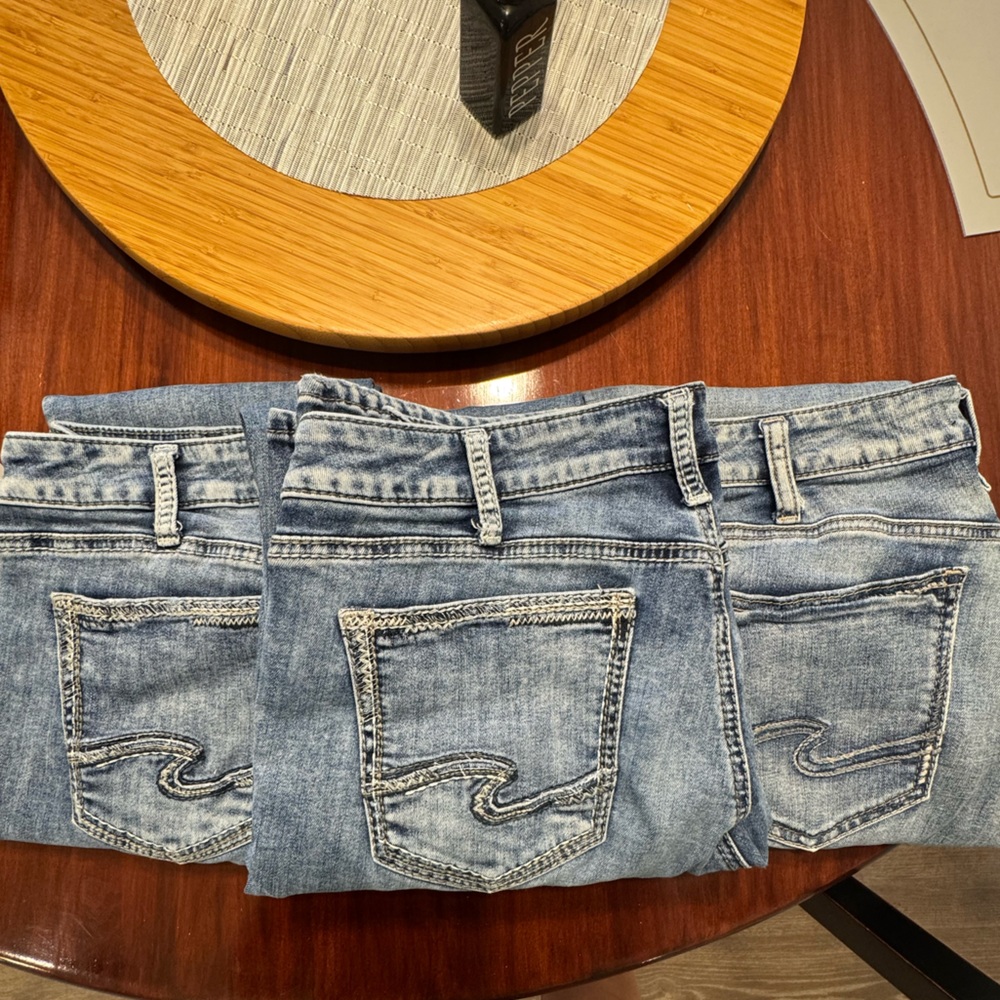 Lot of Boot Cut silver jeans - suki